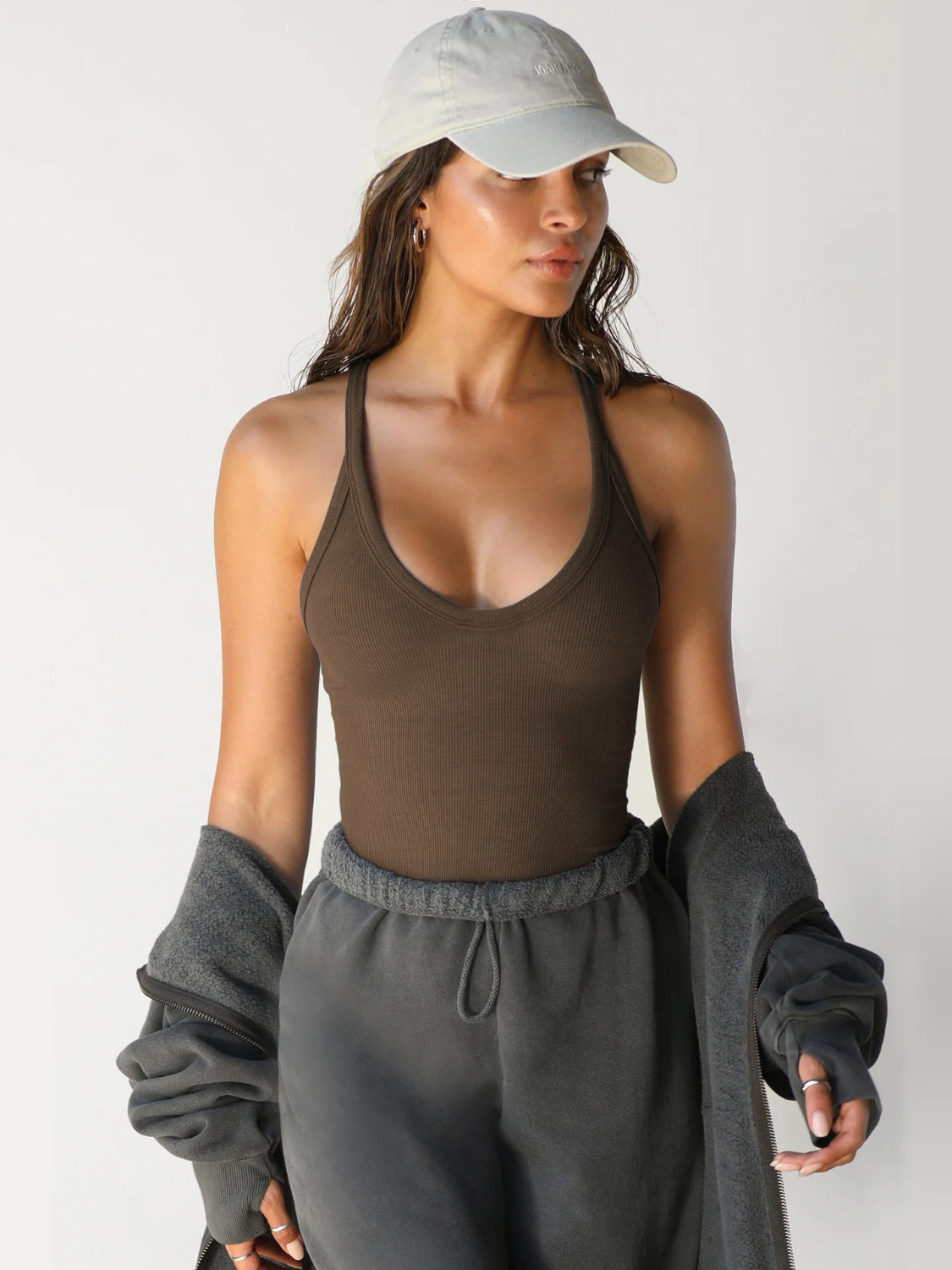 Scoop neck wide strap tank, opaque and moderately stretchy.