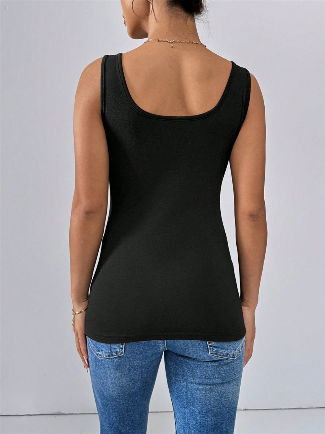 Scoop neck wide strap tank, opaque and slightly stretchy.