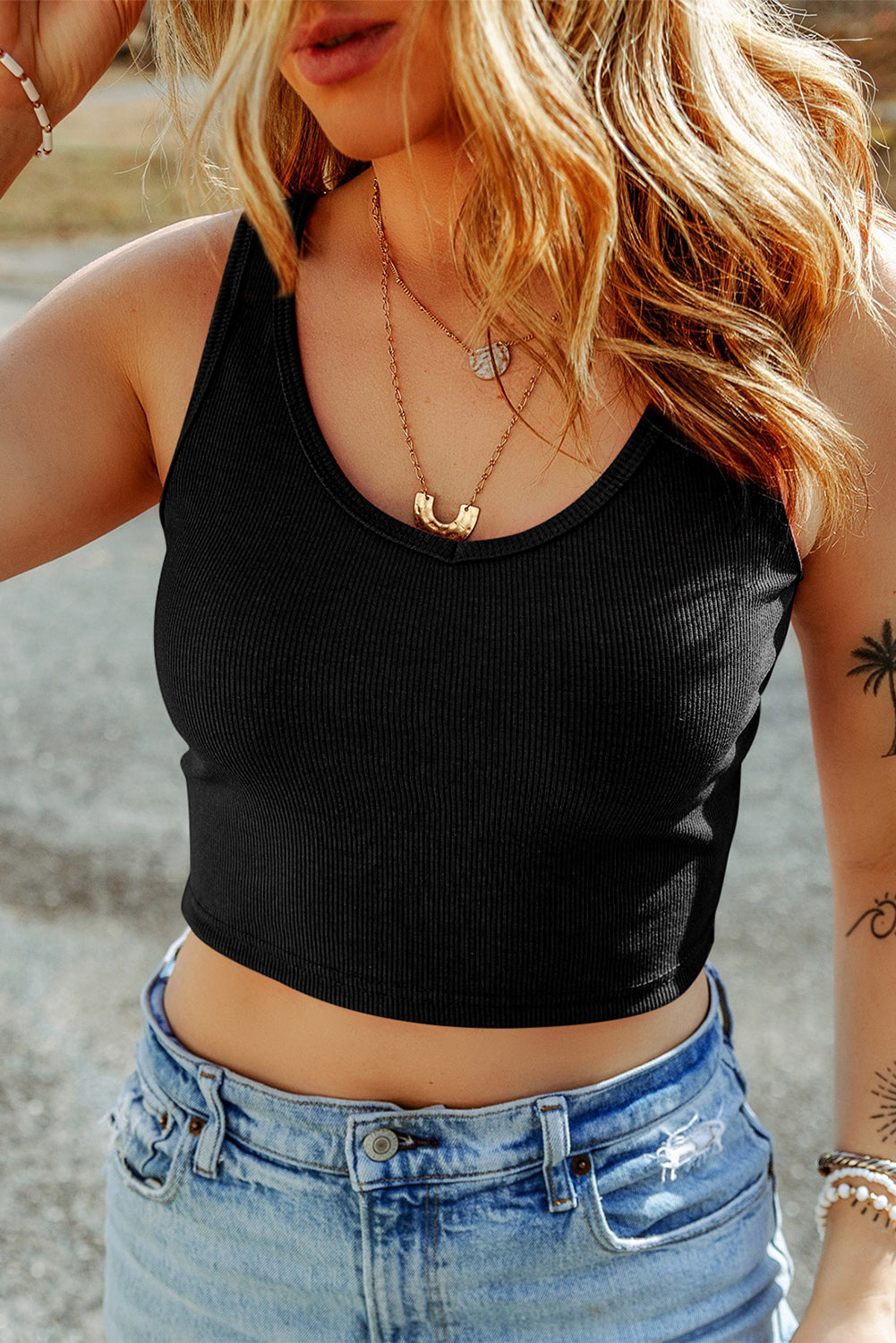 Scoop neck wide strap tank, opaque and slightly stretchy.