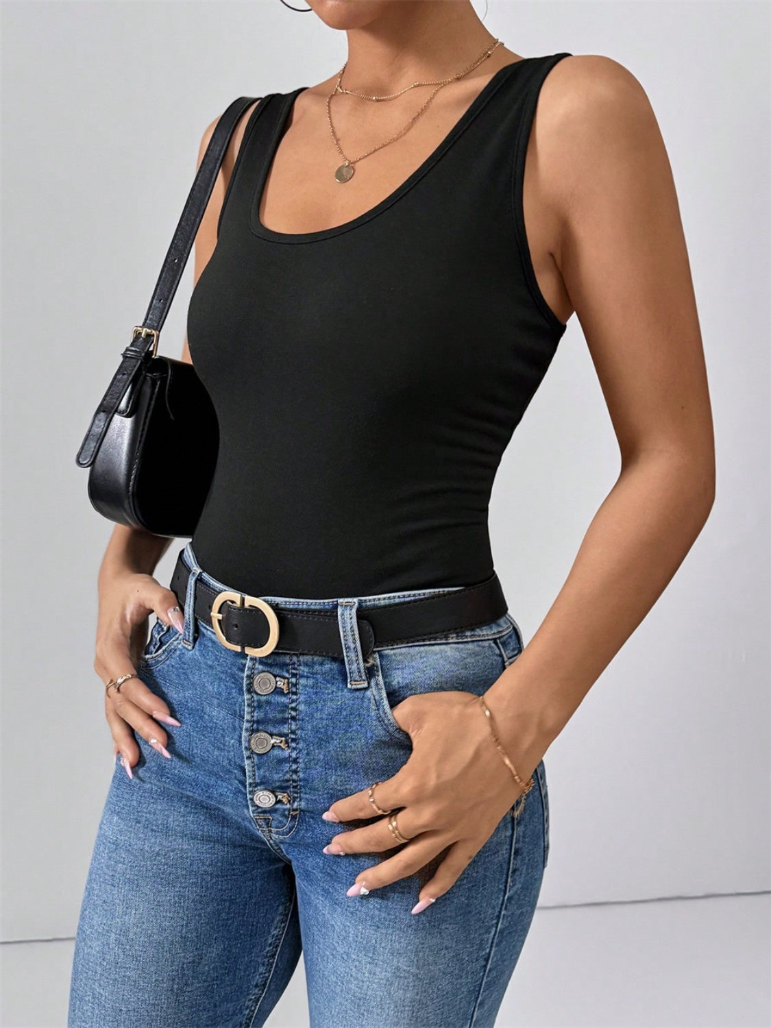 Scoop neck wide strap tank, opaque and slightly stretchy.