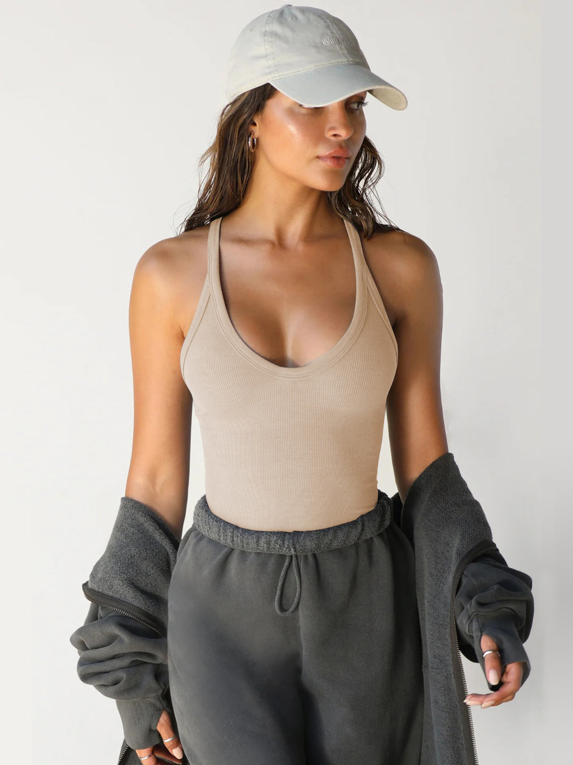 Scoop neck wide strap tank, opaque and moderately stretchy.