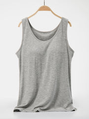 Scoop neck wide strap tank, opaque and moderately stretchy.