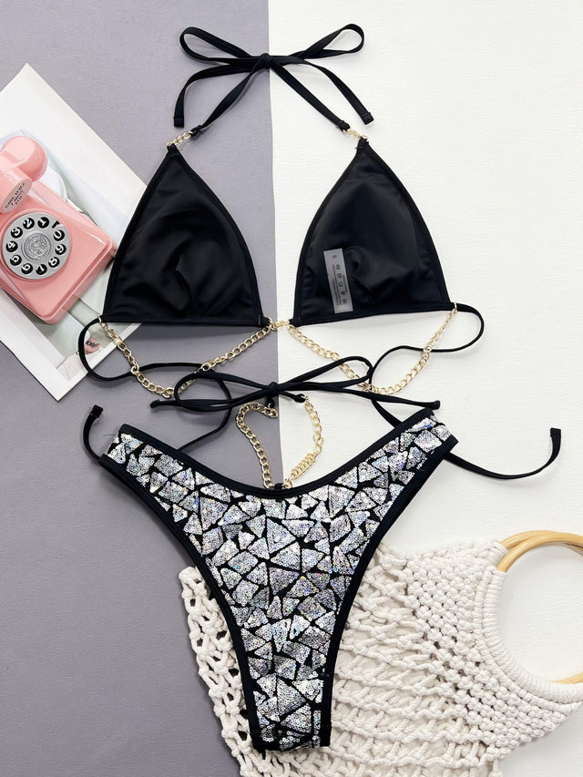Sequin halter neck two-piece bikini set with removable padding.