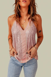 Sequin racerback tank with adjustable elastic strap.