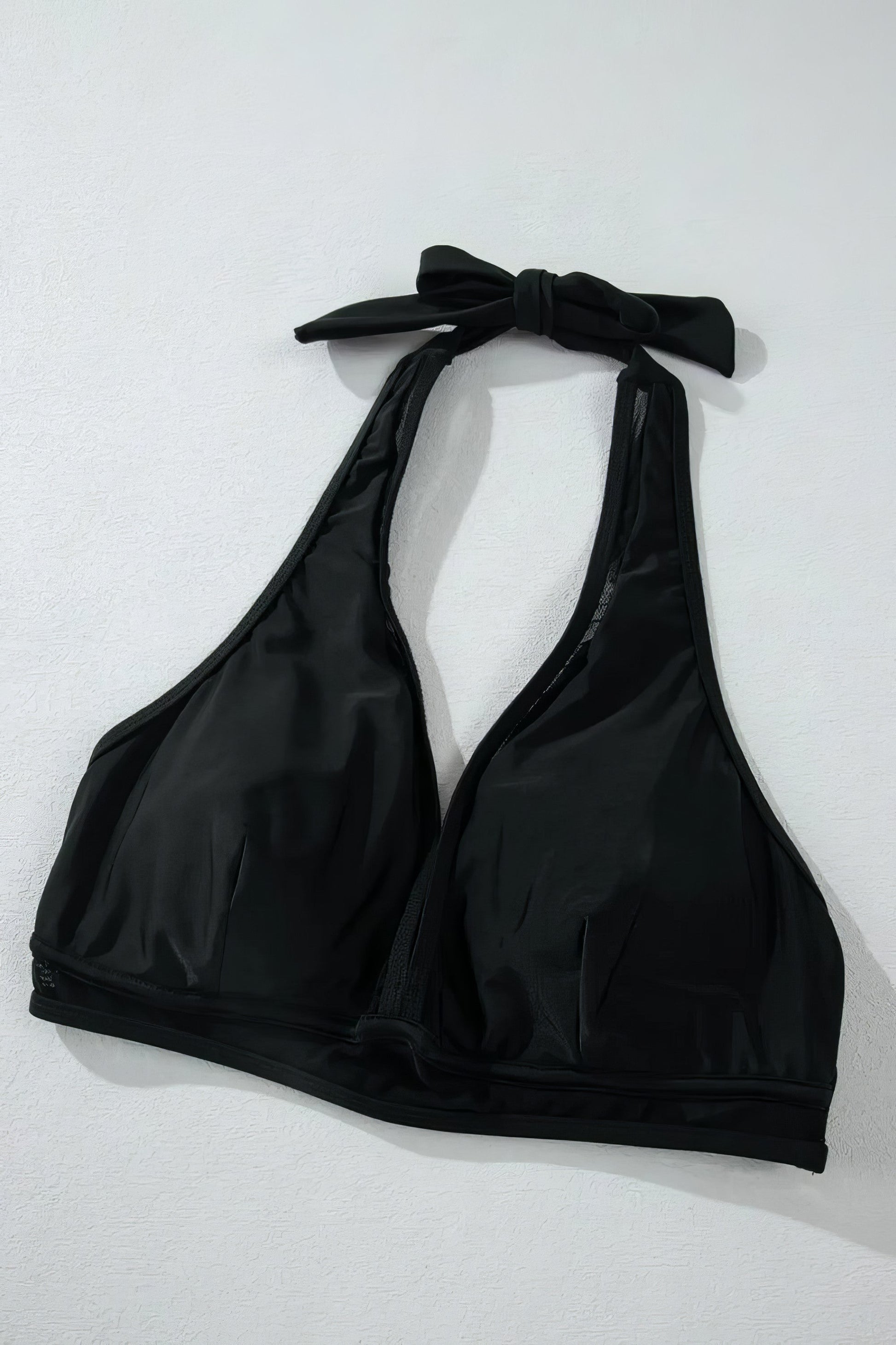 Sheer mesh edged halter V-neck push-up bikini set with removable padding and tie details.
