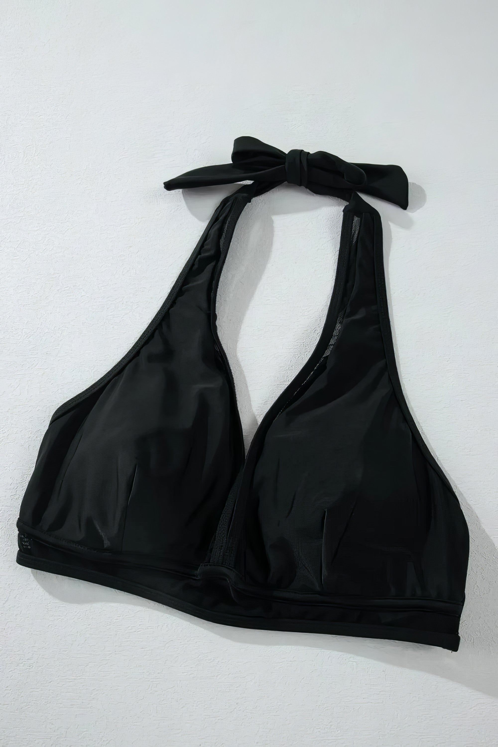 Sheer mesh edged halter V-neck push-up bikini set with removable padding and tie details.