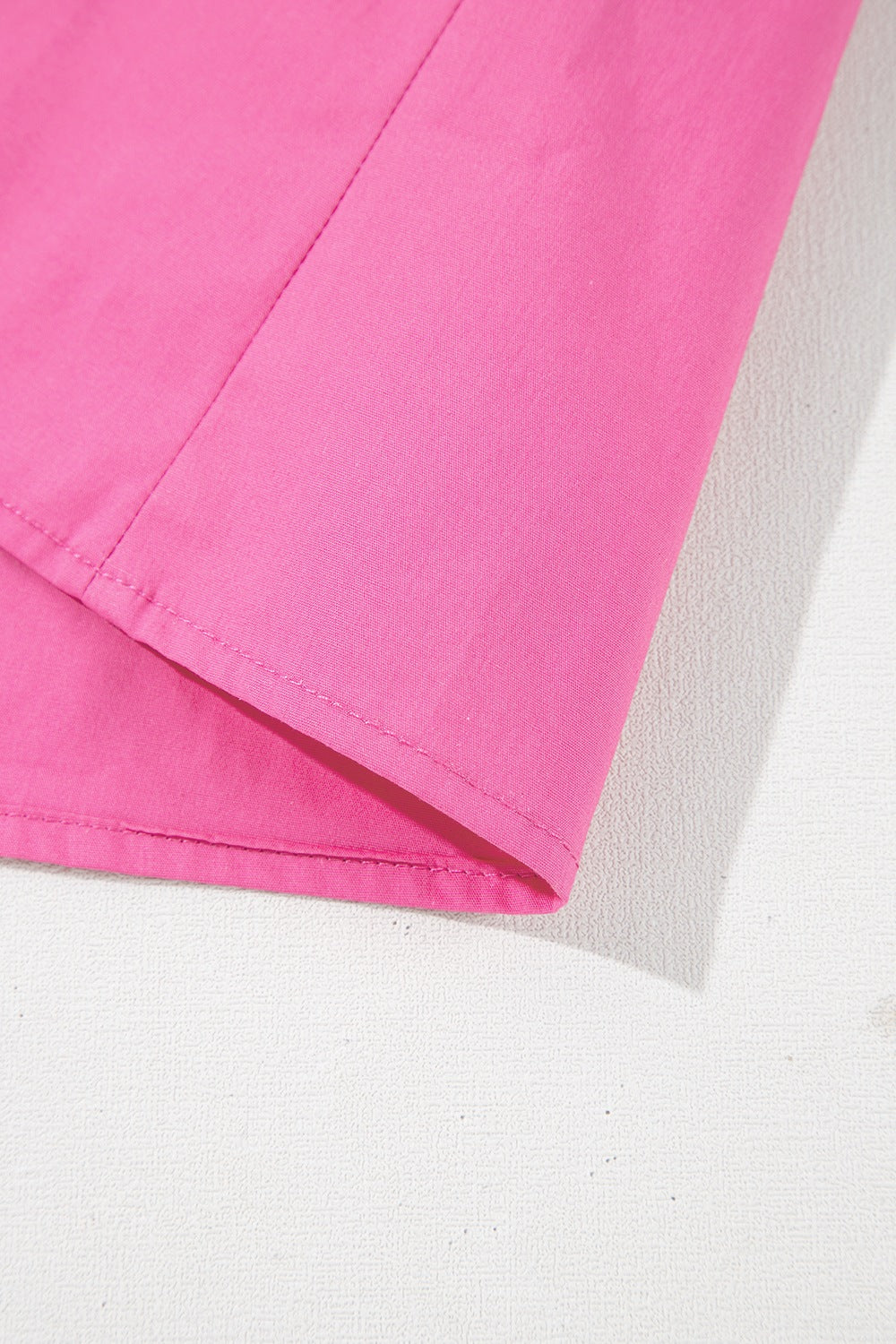 Shirred Tie Neck Ruffled Cap Sleeve Blouse.