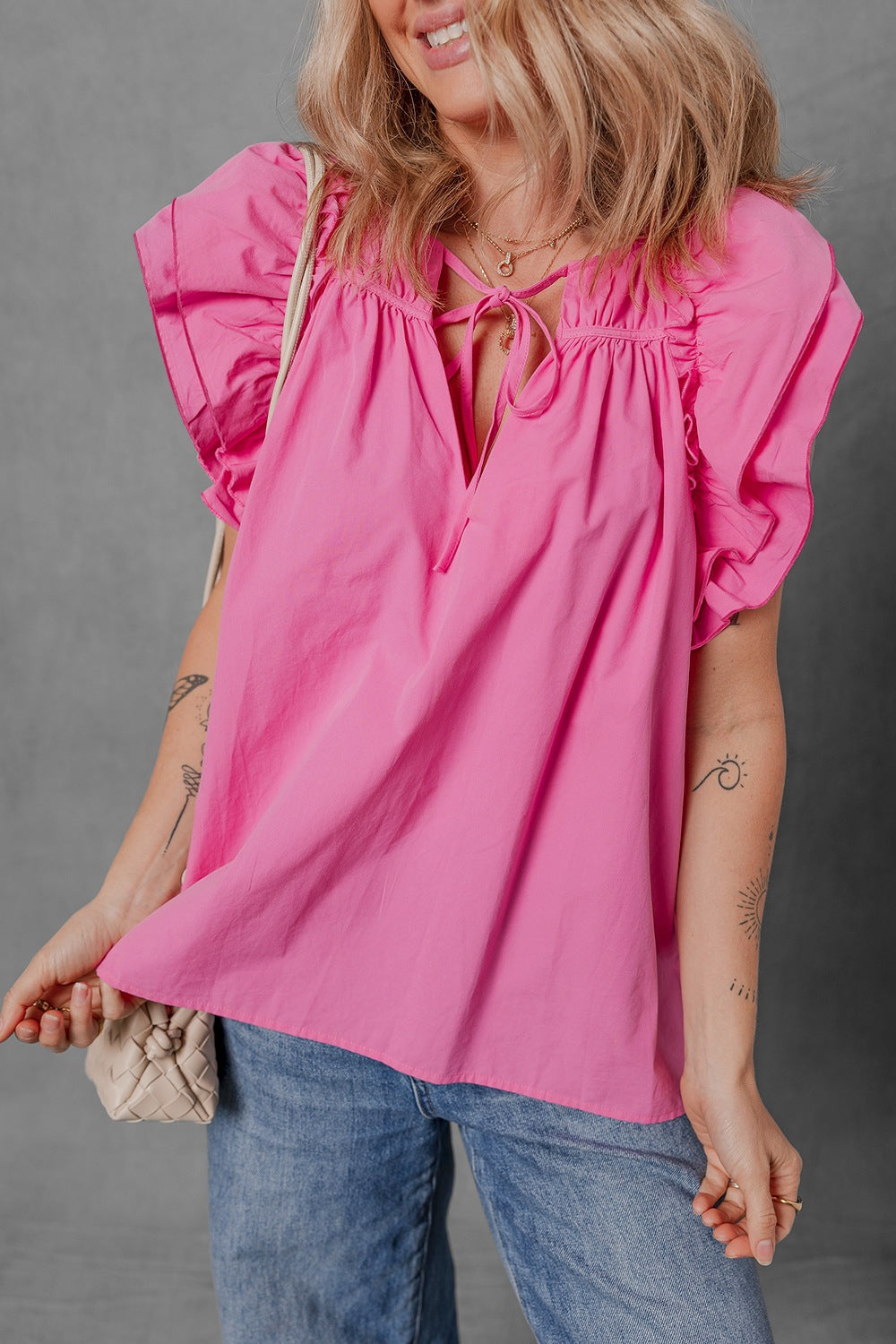 Shirred Tie Neck Ruffled Cap Sleeve Blouse.