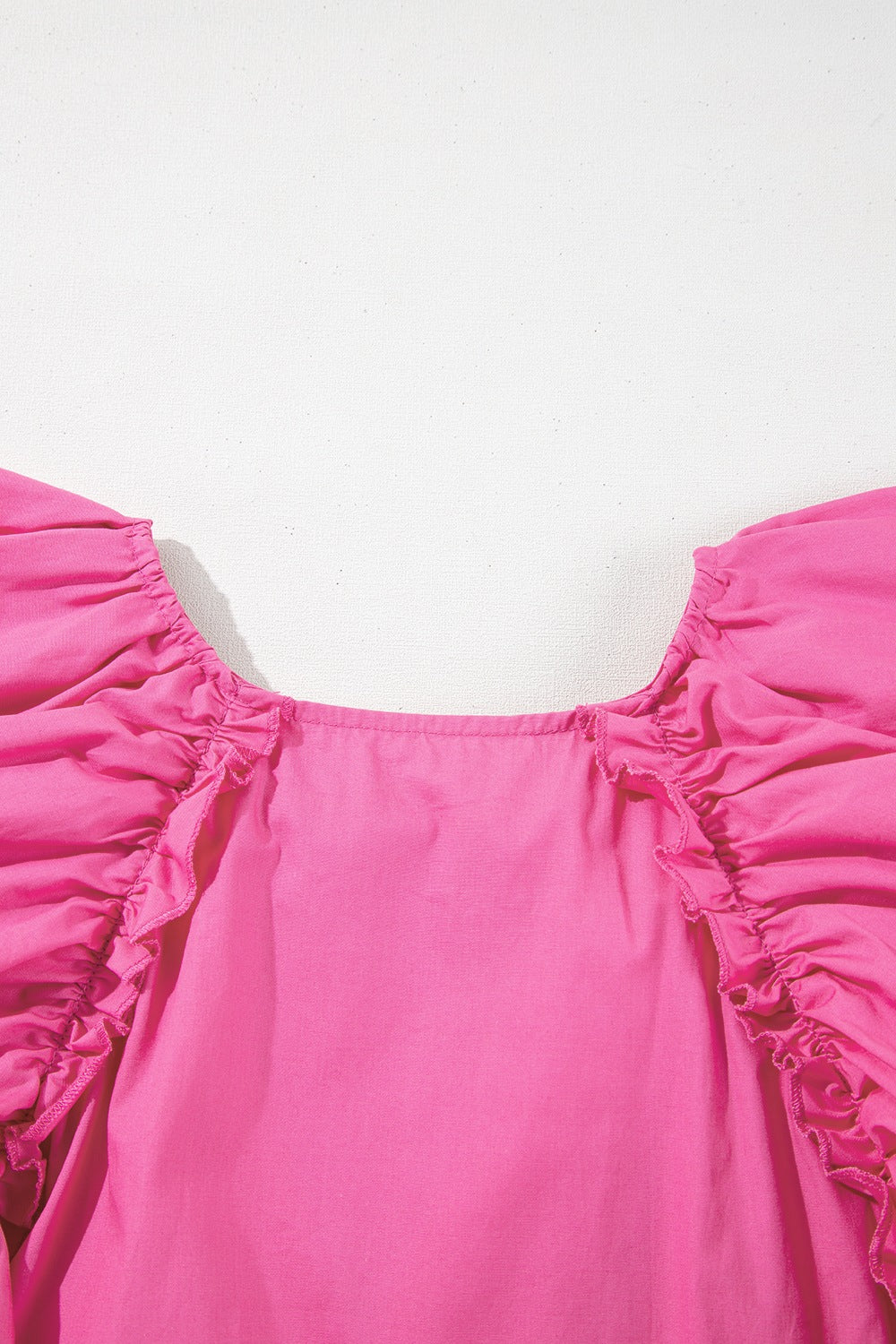 Shirred Tie Neck Ruffled Cap Sleeve Blouse.