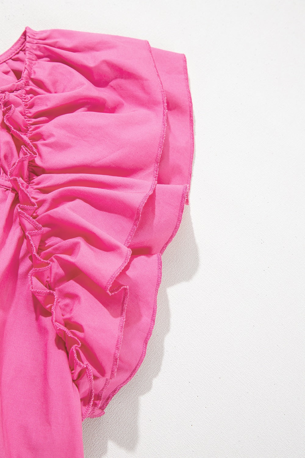 Shirred Tie Neck Ruffled Cap Sleeve Blouse.