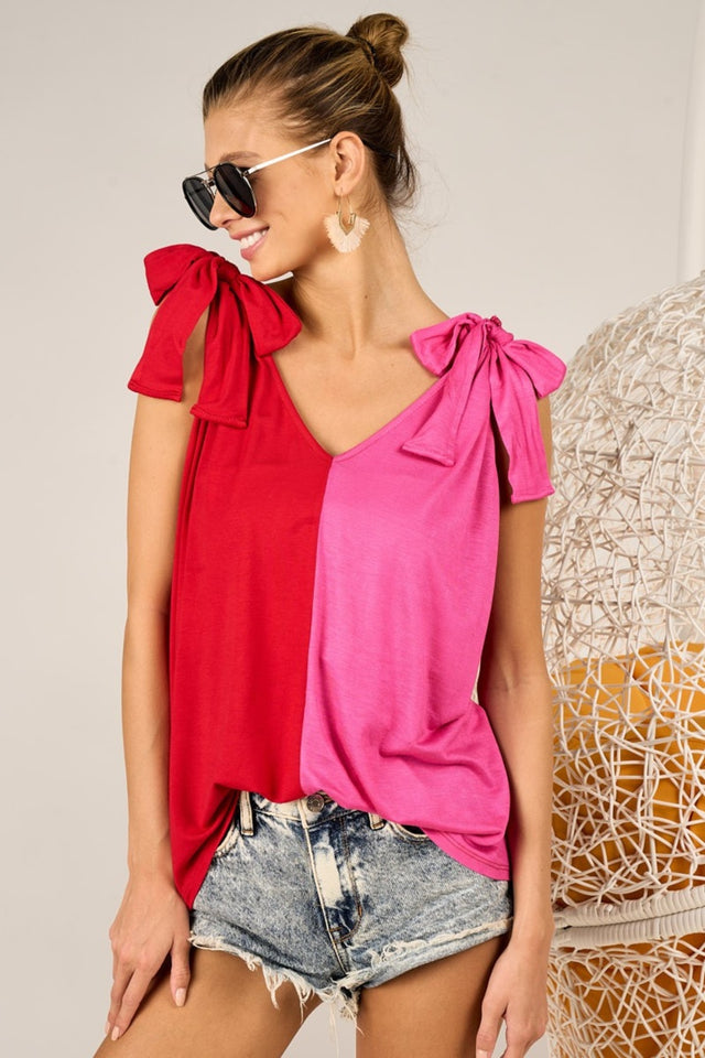 Full size sheer butterfly sleeve star print top with ruffle and tiered details, moderately stretchy.