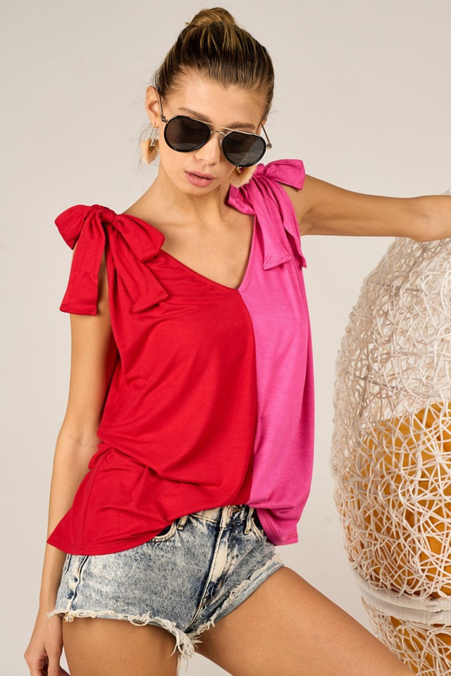 Full size sheer butterfly sleeve star print top with ruffle and tiered details, moderately stretchy.