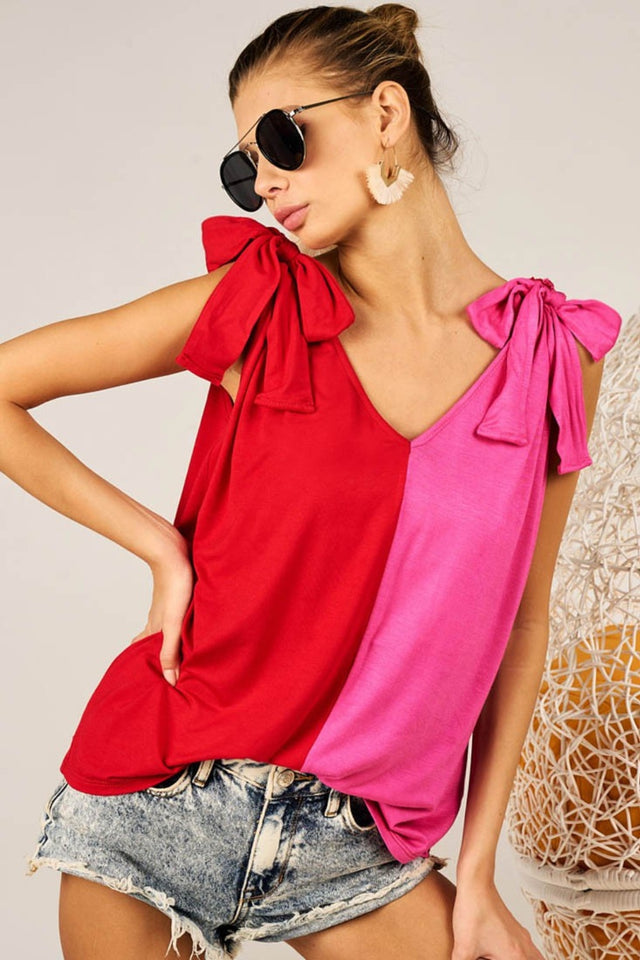 Full size sheer butterfly sleeve star print top with ruffle and tiered details, moderately stretchy.