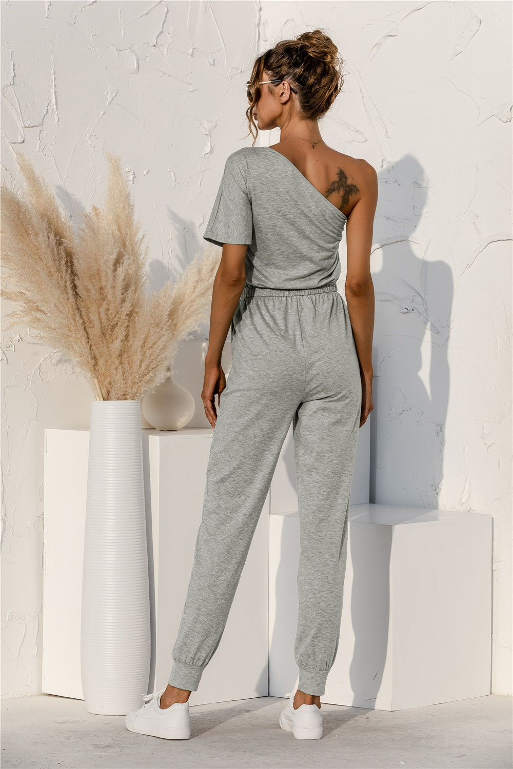 Single Shoulder Short Sleeve Jumpsuit with Tie.