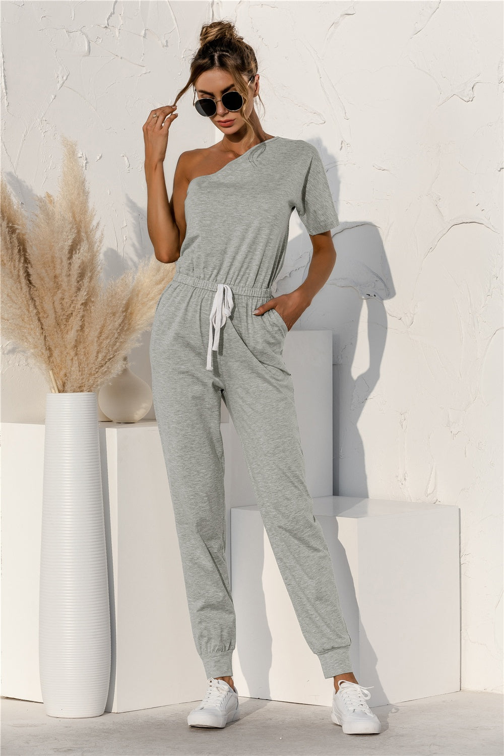 Single Shoulder Short Sleeve Jumpsuit with Tie.