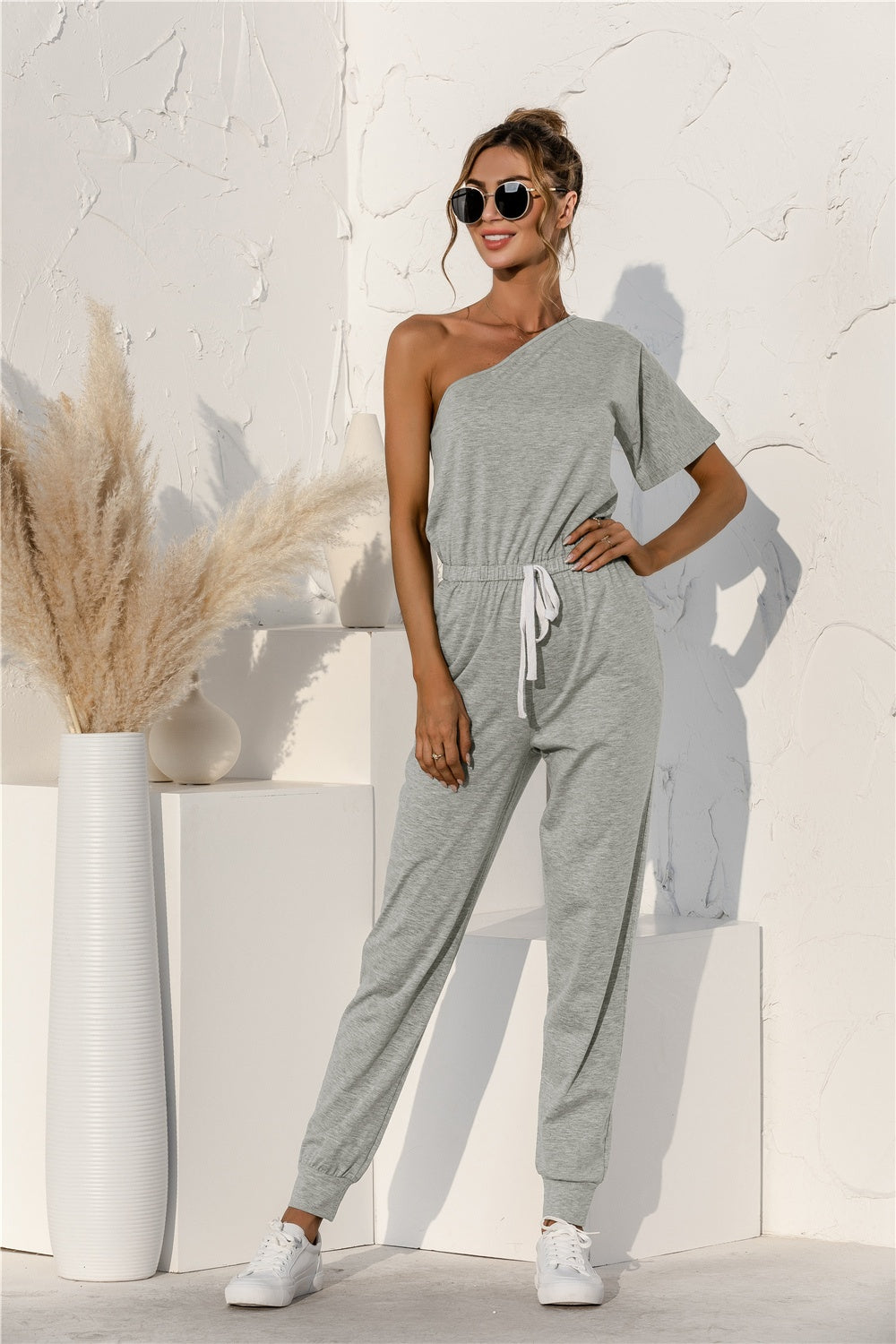 Single Shoulder Short Sleeve Jumpsuit with Tie.