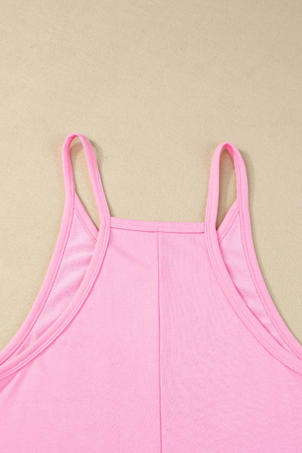 Sleeveless Romper with Pockets.