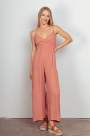 Half Zip Sleeveless Jumpsuit with Pockets and Tie.