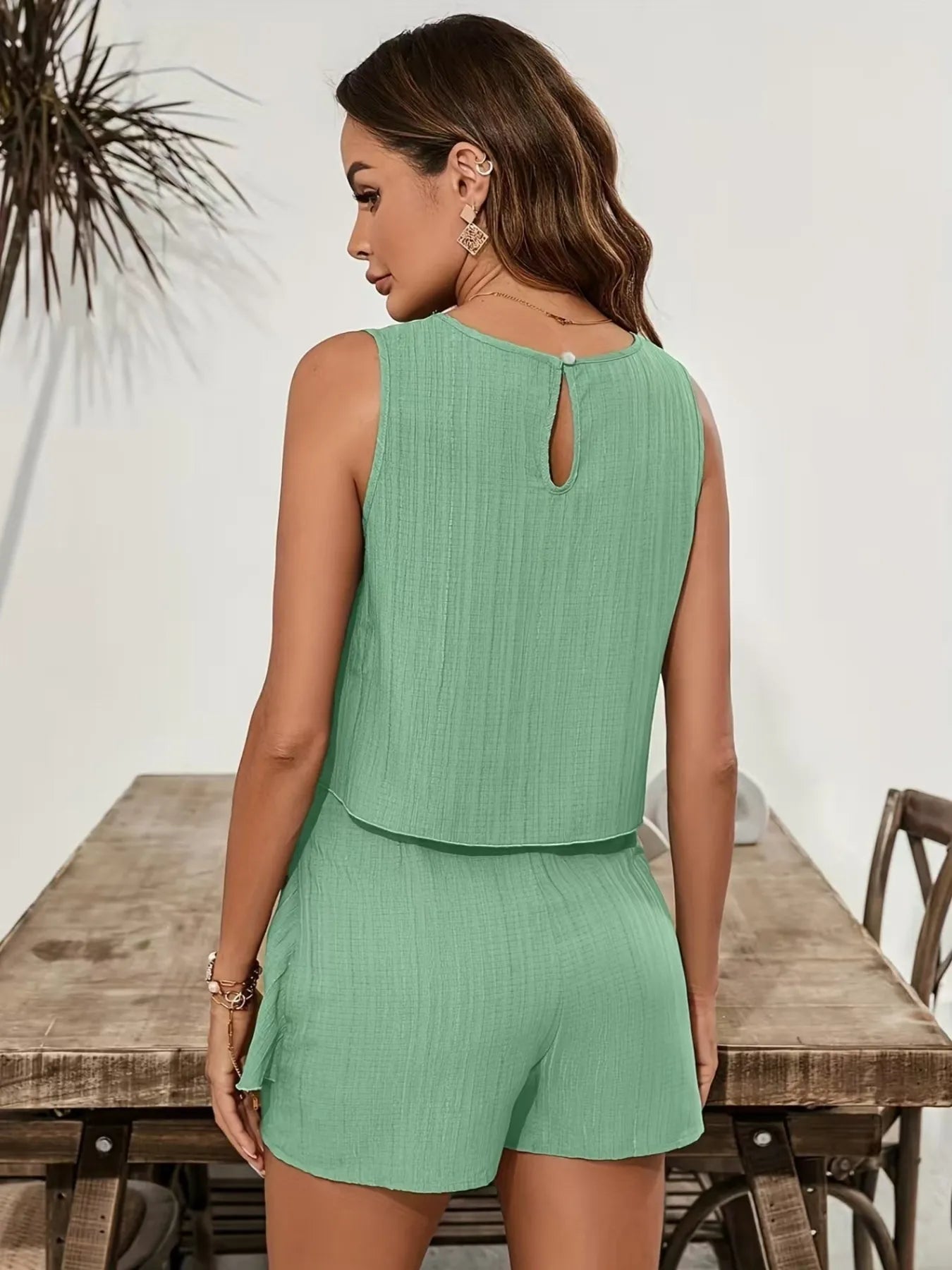 Sleeveless Top and Layered Skirt Set.