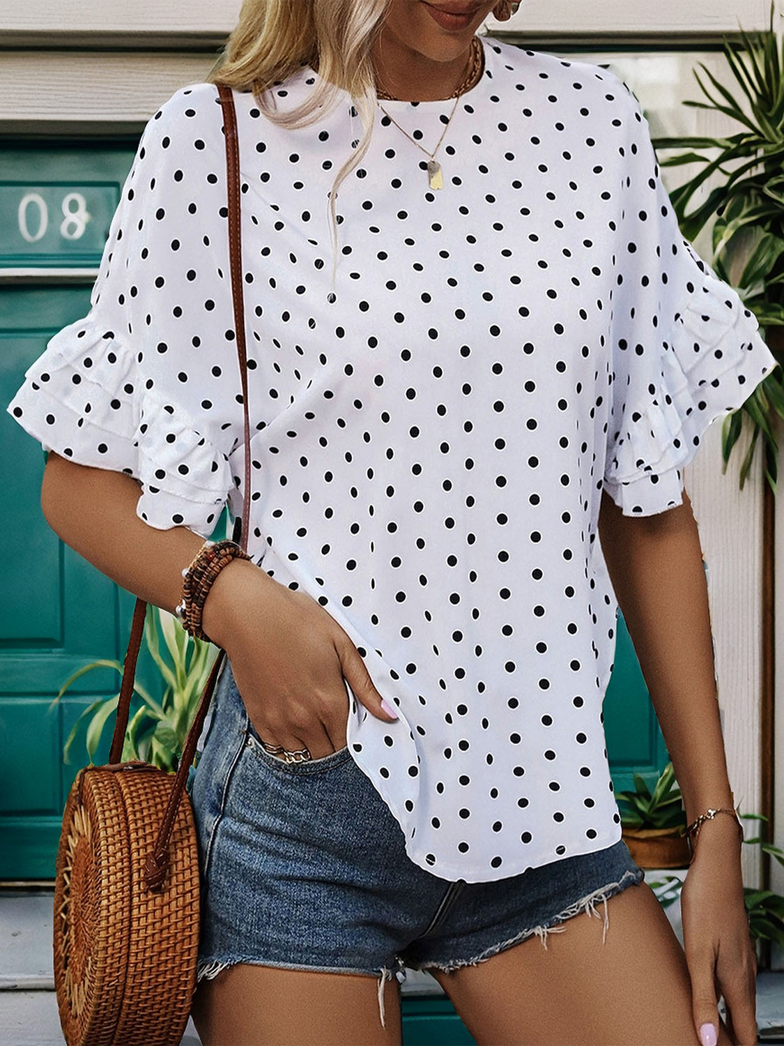 Perfee Slit Polka Dot Round Neck Half Sleeve Blouse.