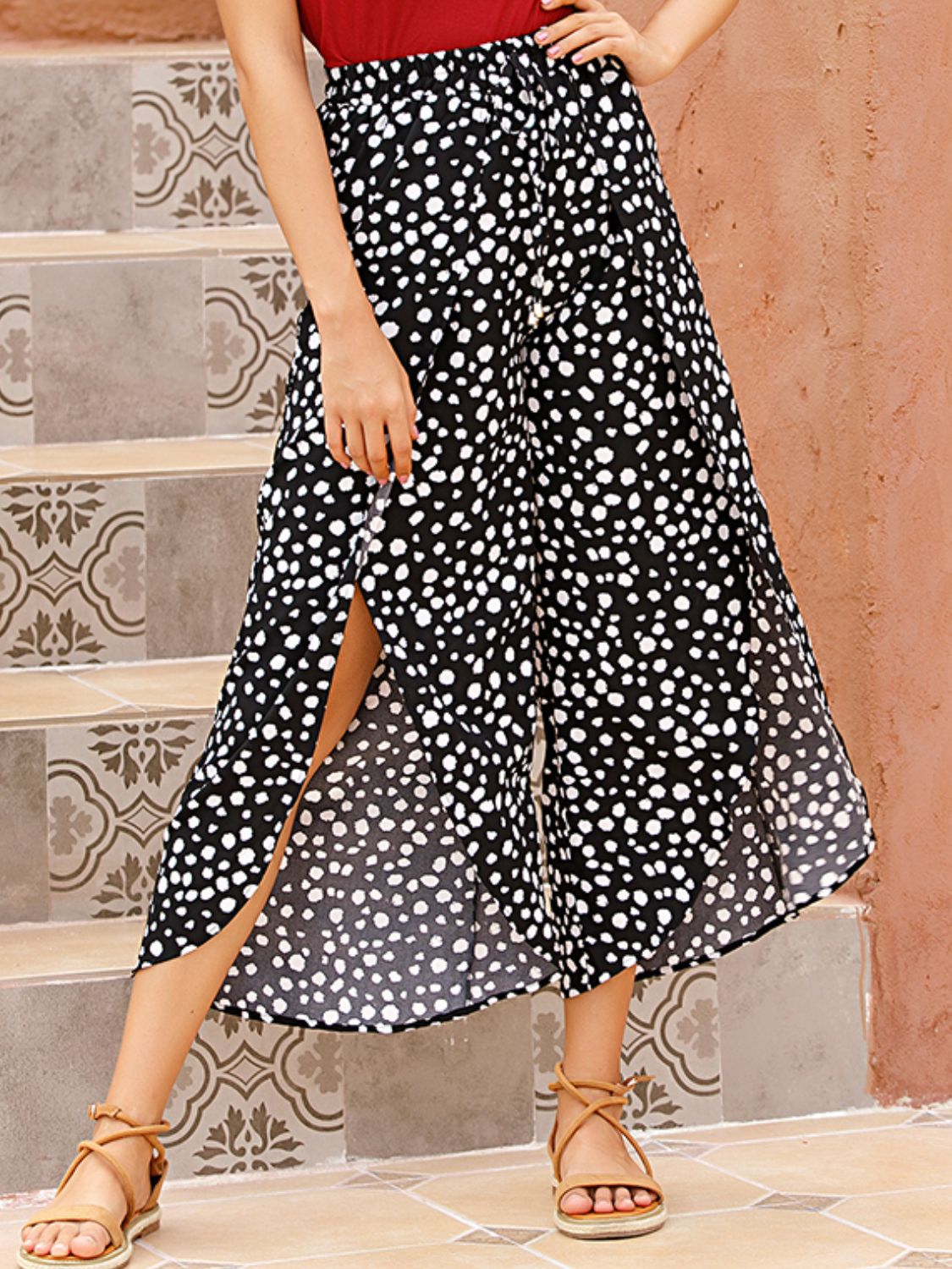 Slit polka dot wide leg pants, opaque.