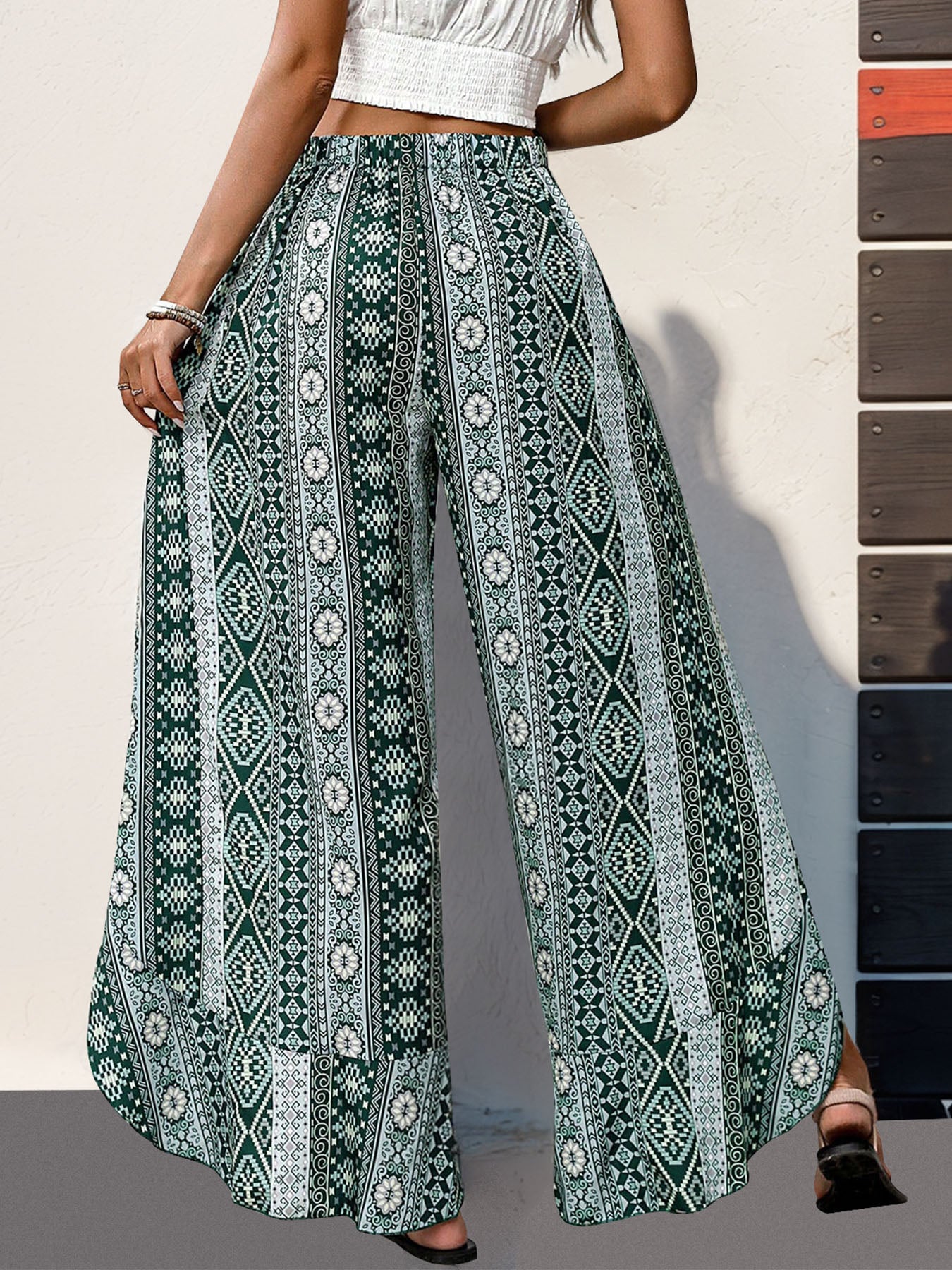 Slit ruffled geometric wide leg pants, opaque.