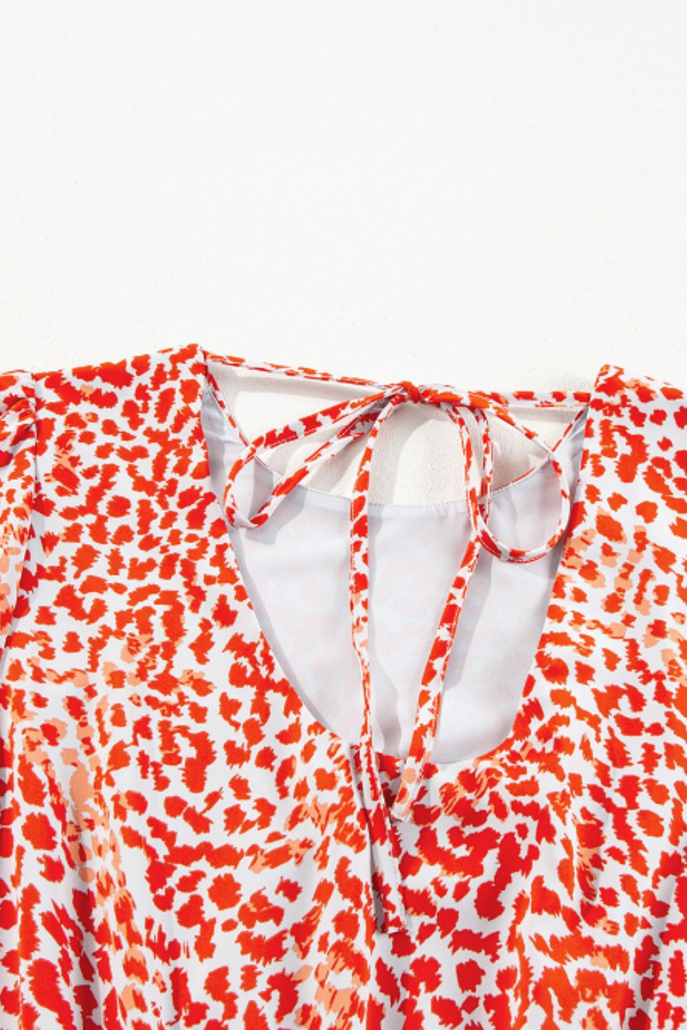 Slit Tied Printed Round Neck Mini Dress.