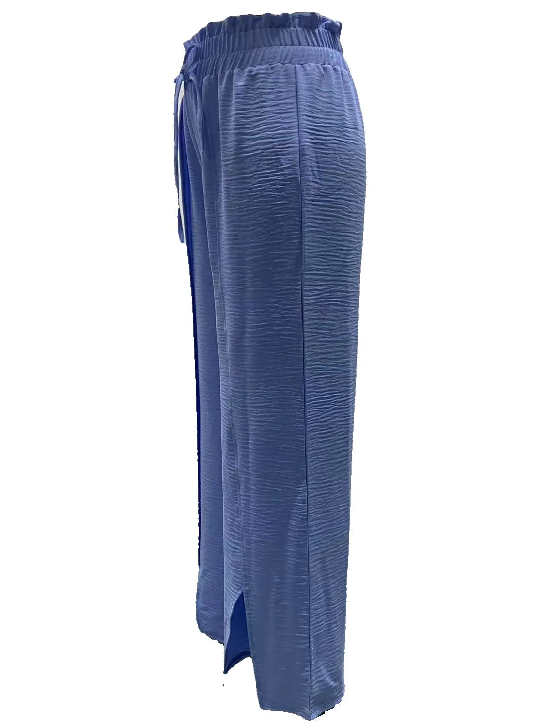 Slit wide leg pants with frill.