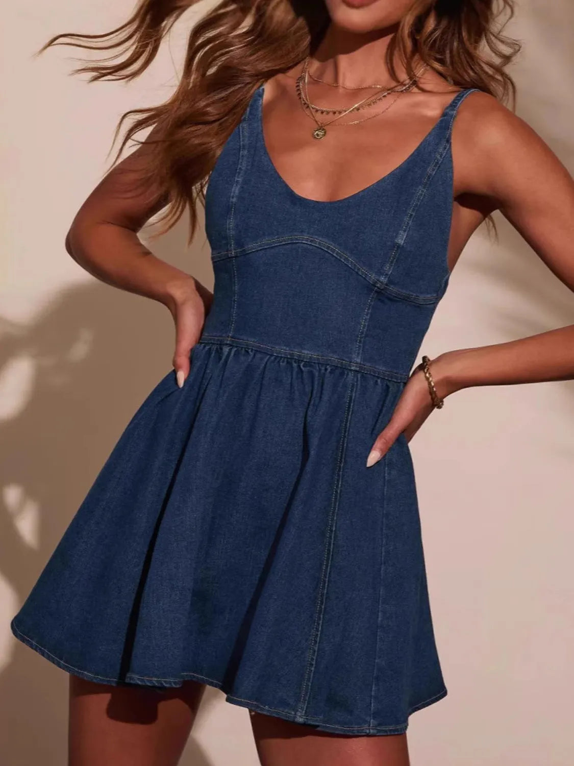 Smocked Back Adjustable Strap Denim Mini Dress.
