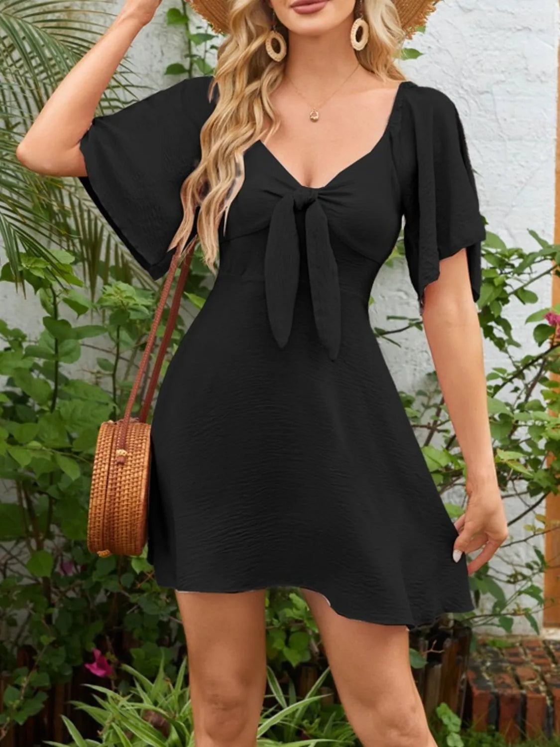 Smocked Back Knotted Flutter Sleeve Dress.