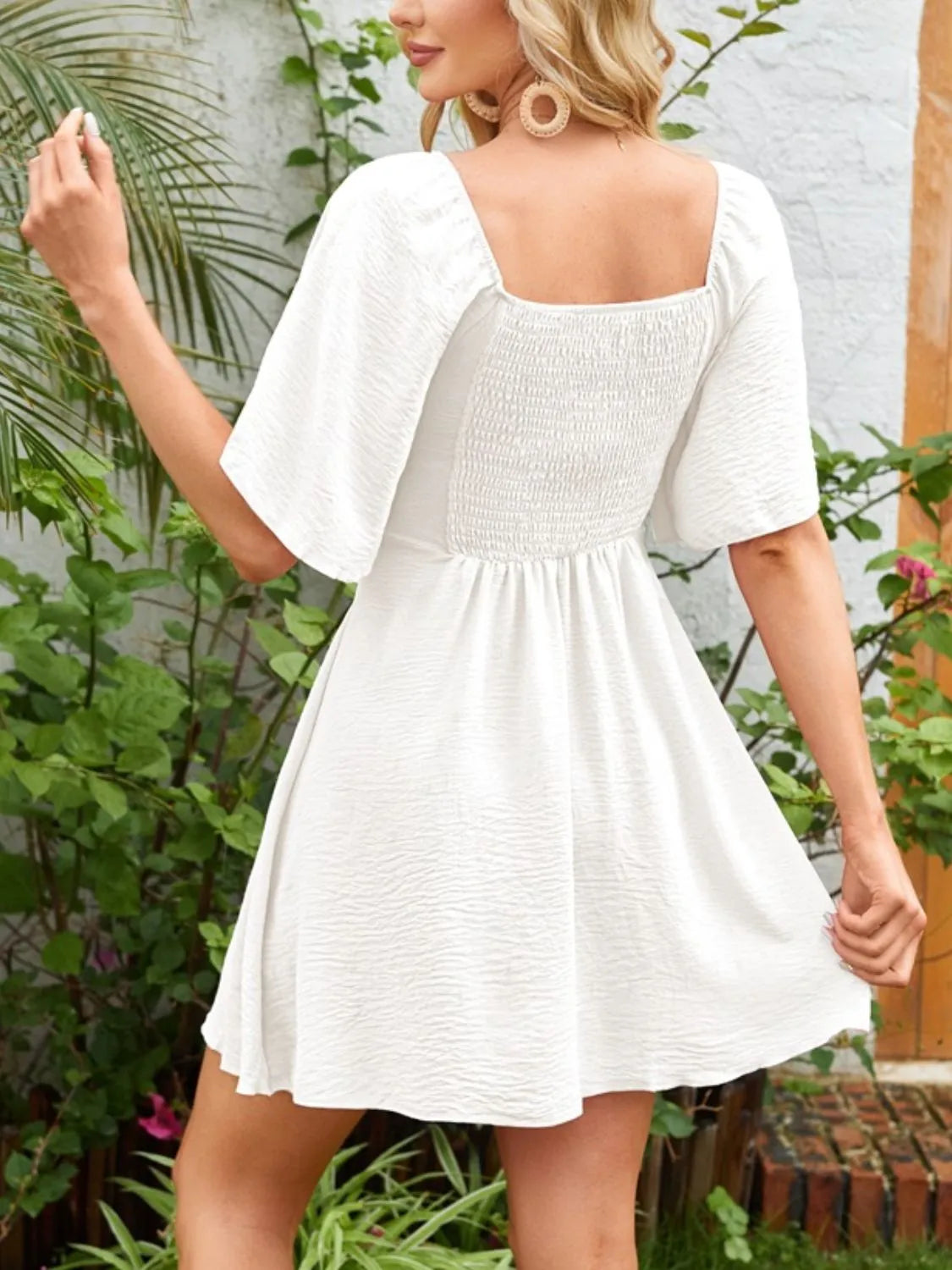 Smocked Back Knotted Flutter Sleeve Dress.