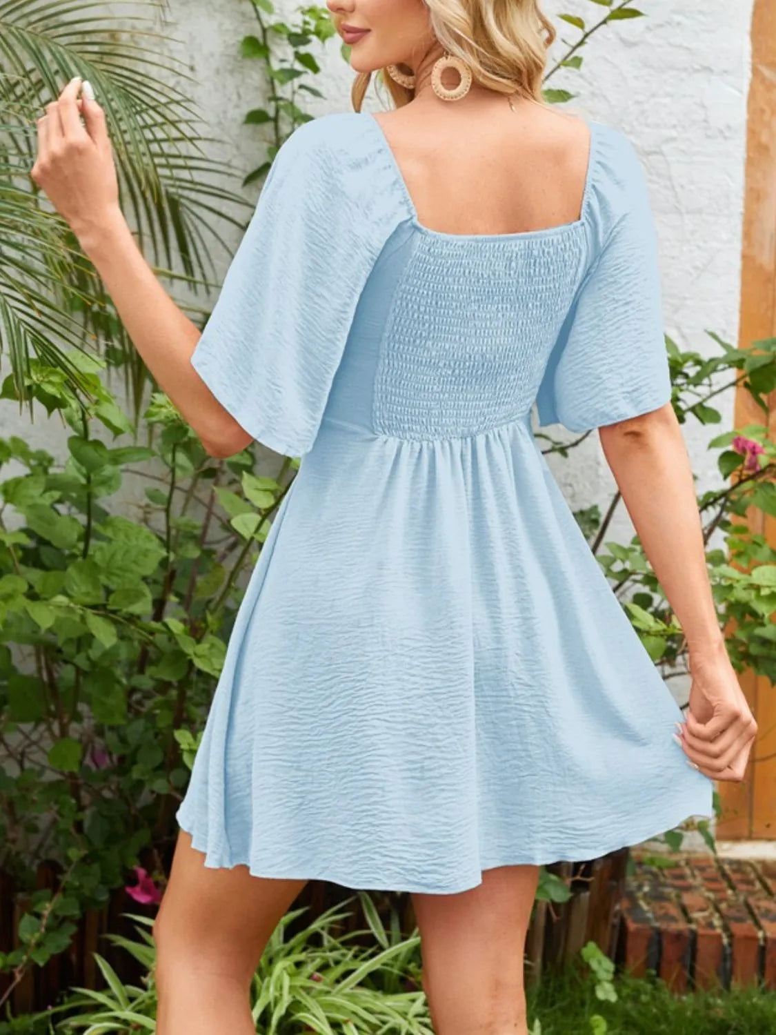 Smocked Back Knotted Flutter Sleeve Dress.