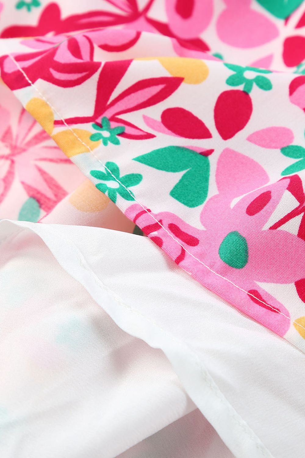 Smocked Floral V-Neck Ruffled Cap Sleeve Dress.