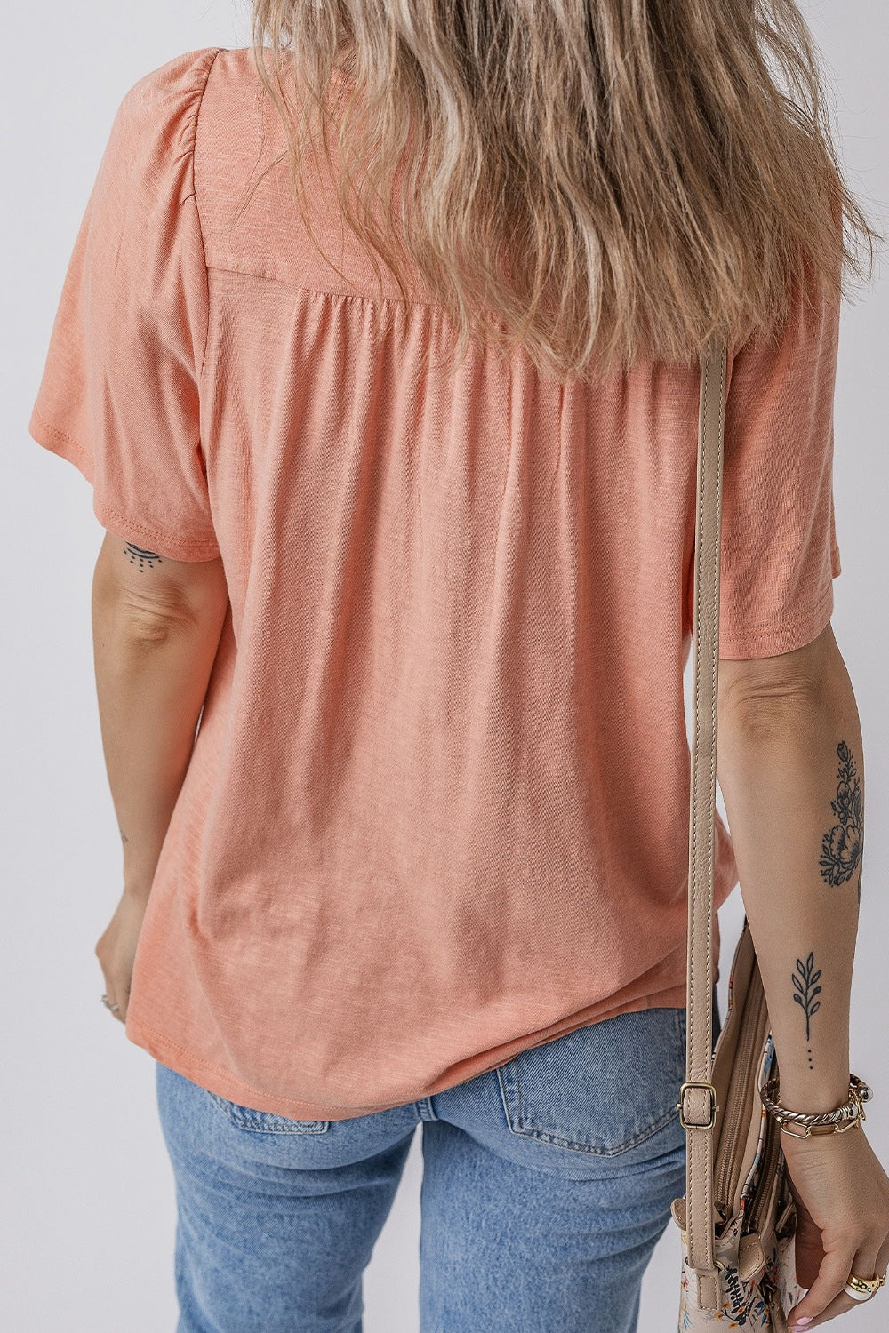 Smocked Front V Neck Short Sleeve Top.