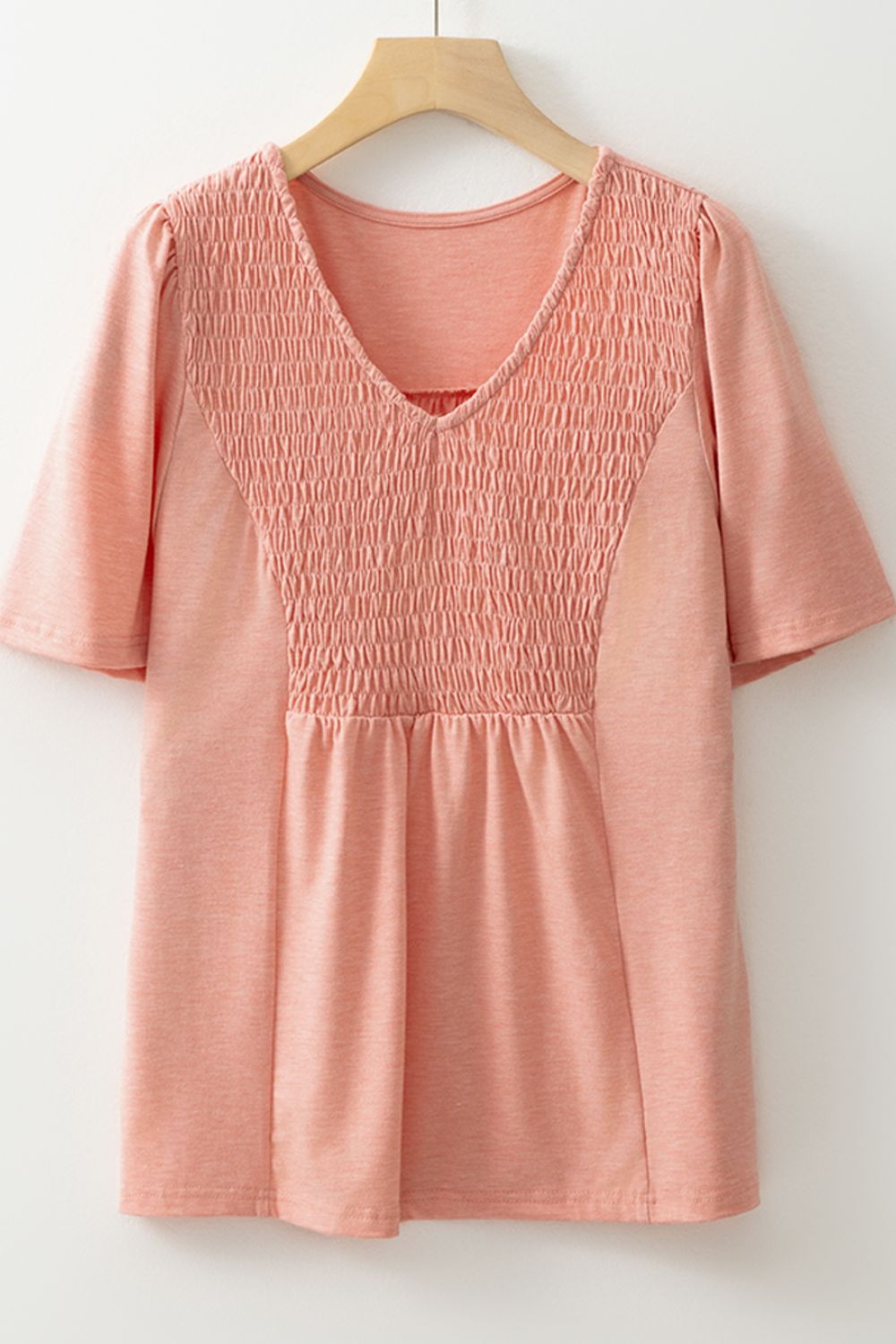 Smocked Front V Neck Short Sleeve Top.
