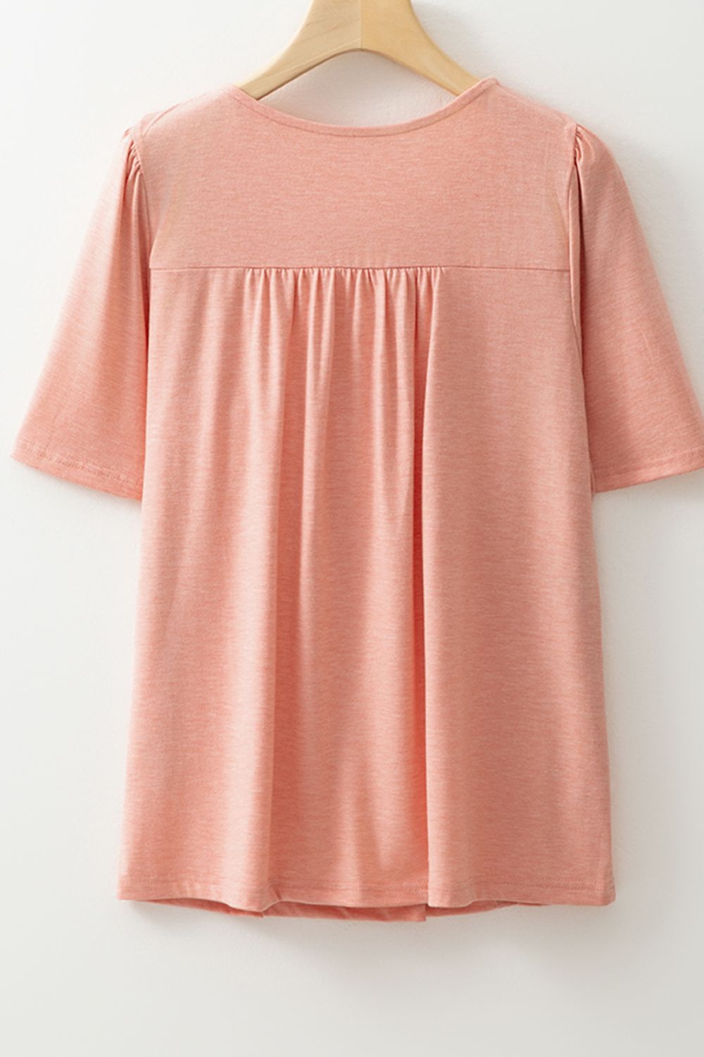 Smocked Front V Neck Short Sleeve Top.