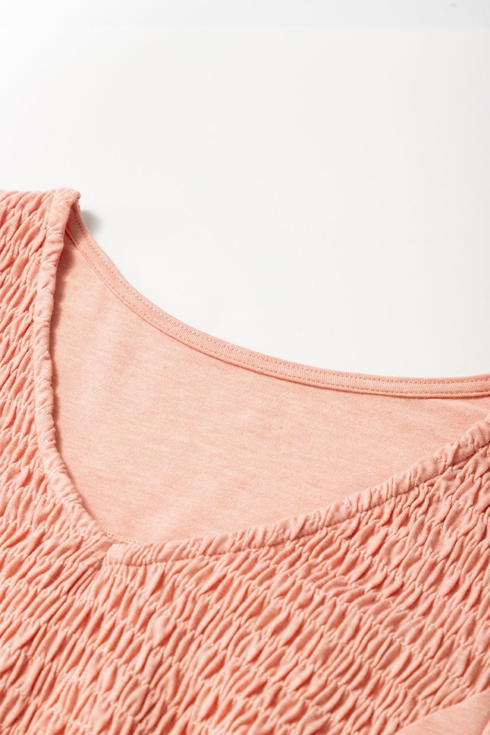 Smocked Front V Neck Short Sleeve Top.