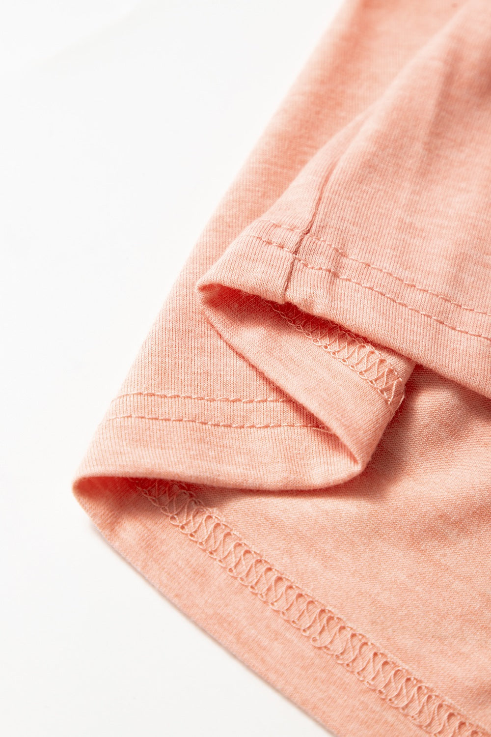 Smocked Front V Neck Short Sleeve Top.