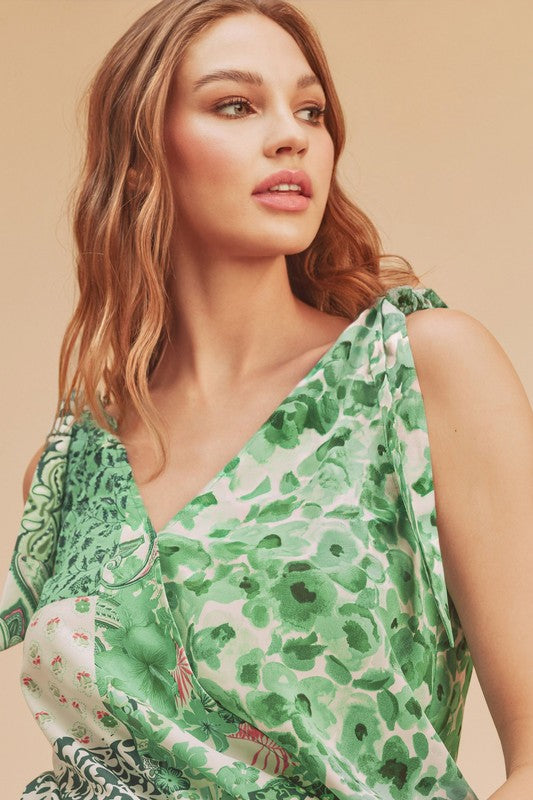 Smocked hem printed surplice tank, opaque and slightly stretchy.