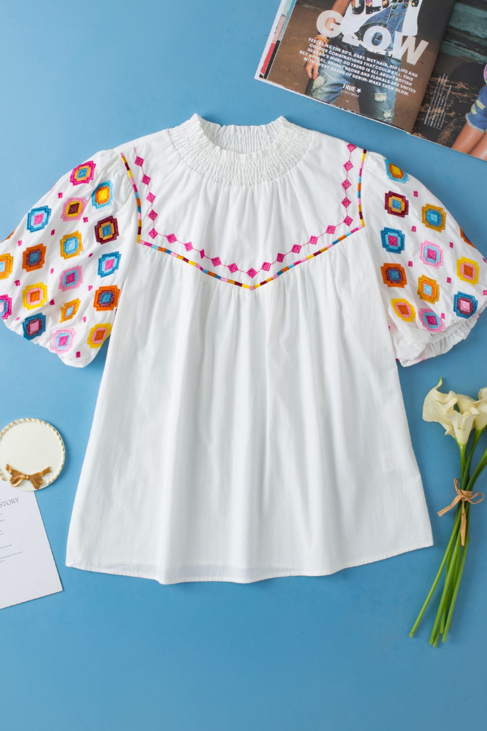 Smocked Neck Embroidered Puff Sleeve Top.