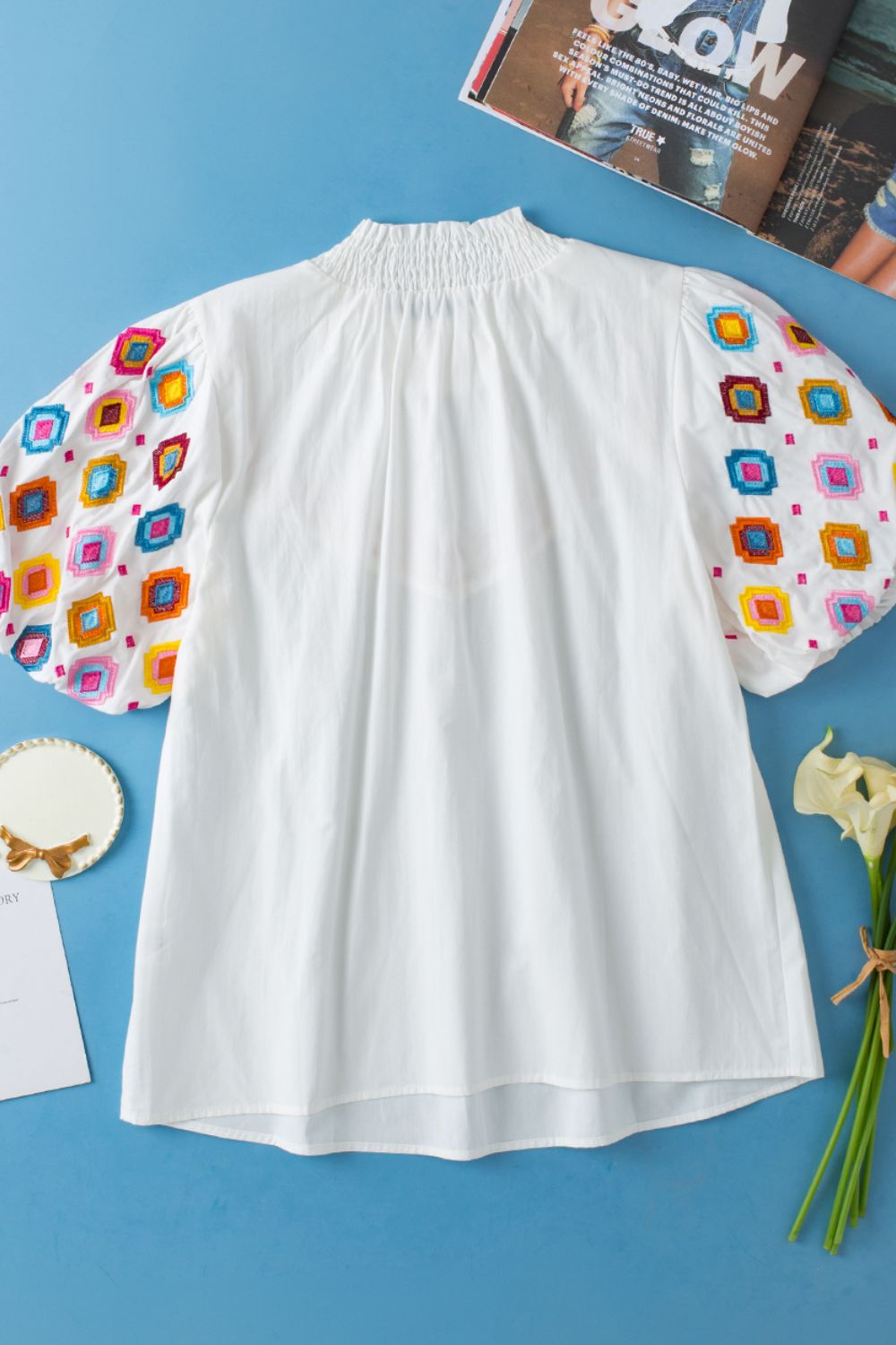 Smocked Neck Embroidered Puff Sleeve Top.