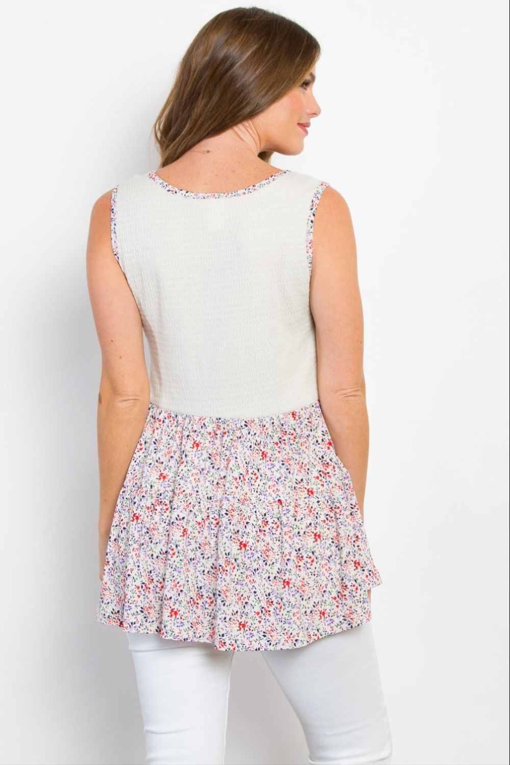 Full size smocked printed peplum sleeveless top, opaque and slightly stretchy.