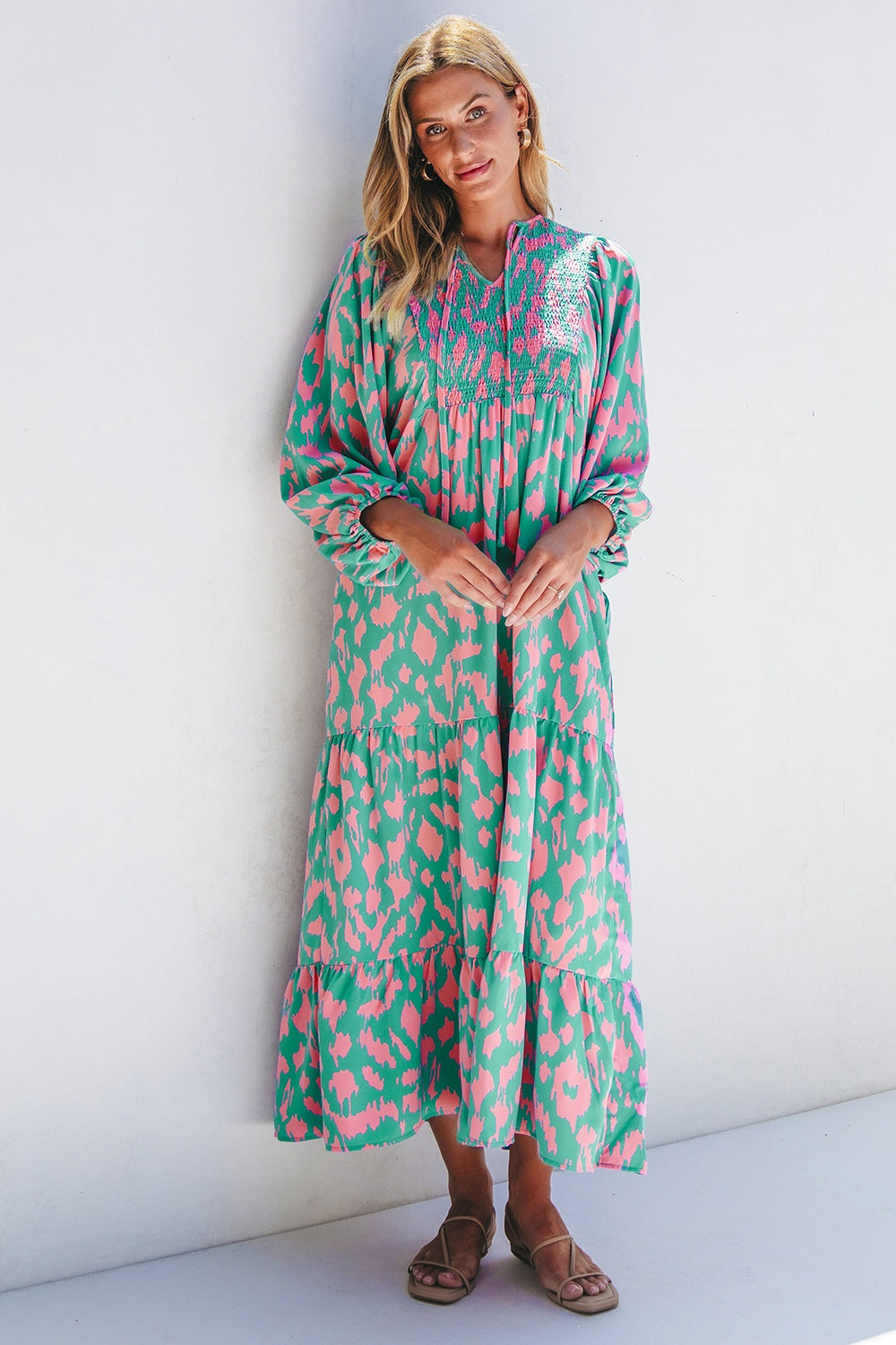 Smocked Printed Tie Neck Long Sleeve Dress.