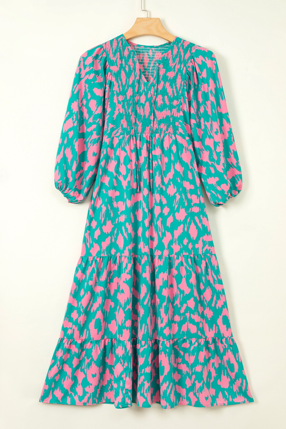 Smocked Printed Tie Neck Long Sleeve Dress.