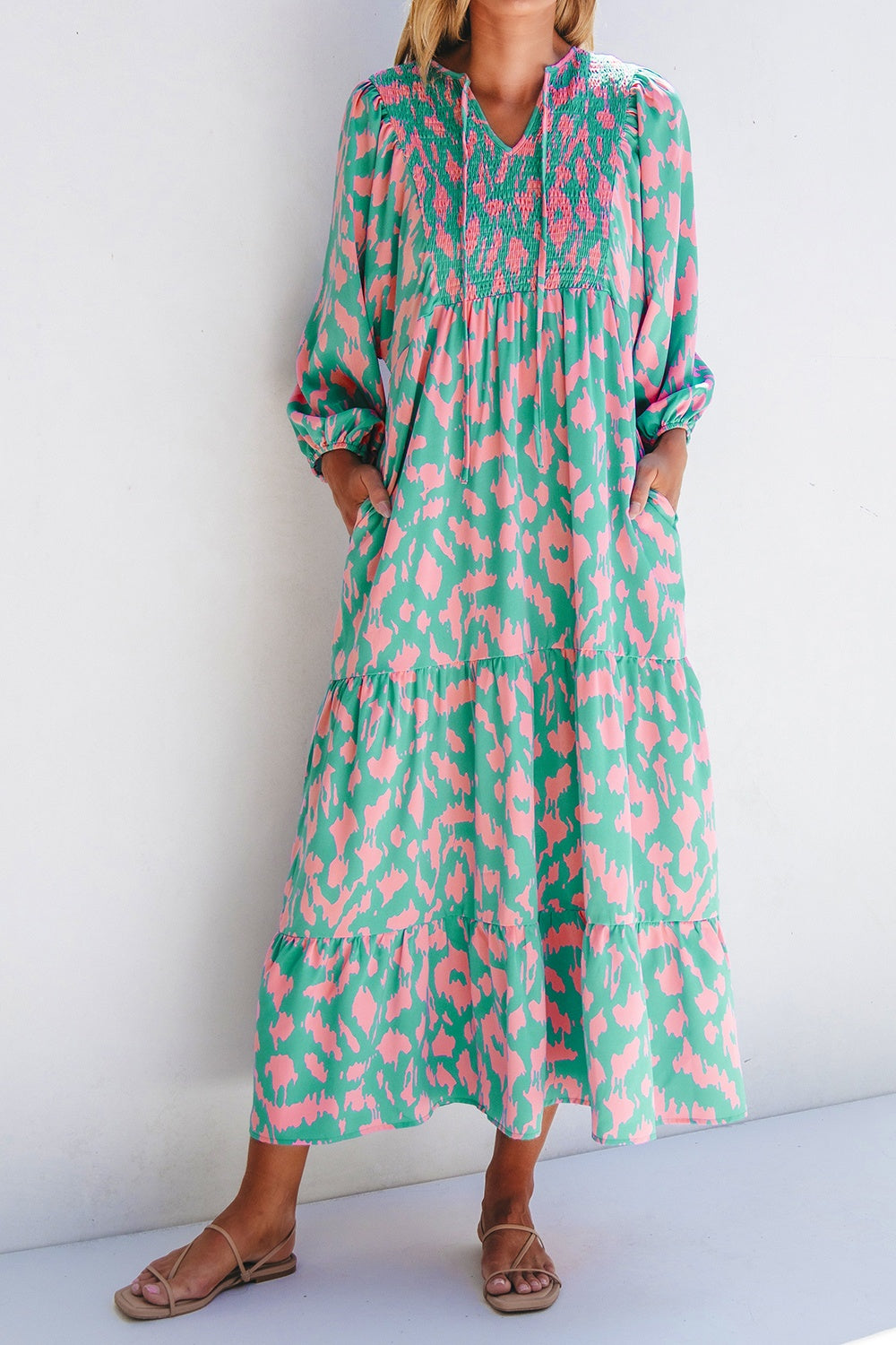Smocked Printed Tie Neck Long Sleeve Dress.