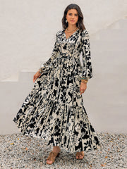 Smocked Printed Tie Neck Long Sleeve Dress.