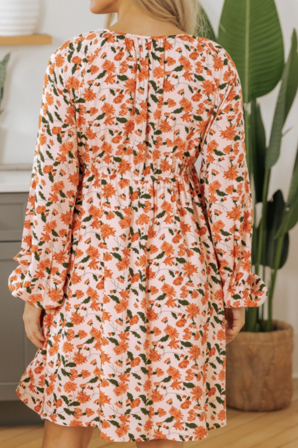 Smocked Printed V-Neck Long Sleeve Dress.