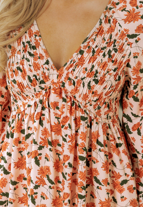 Smocked Printed V-Neck Long Sleeve Dress.