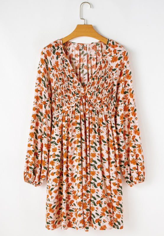 Smocked Printed V-Neck Long Sleeve Dress.