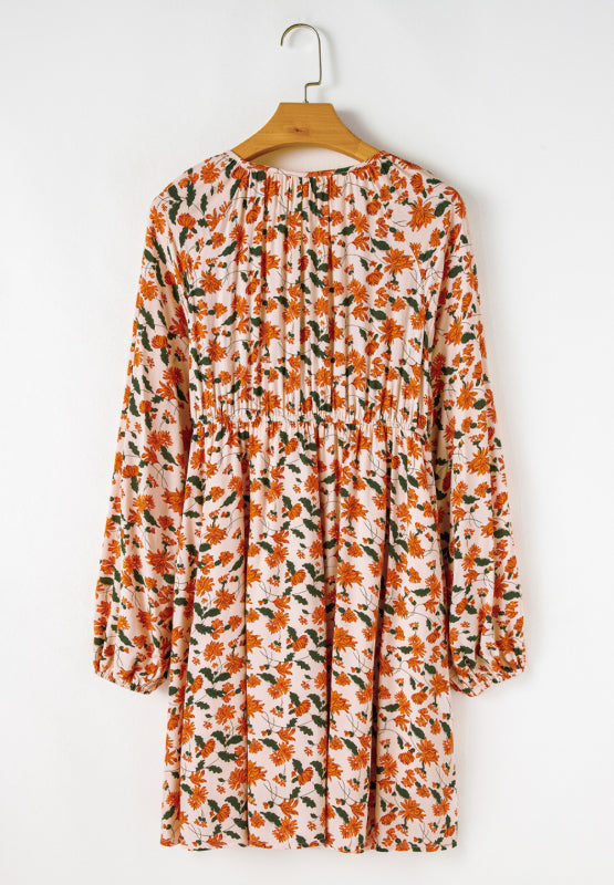 Smocked Printed V-Neck Long Sleeve Dress.